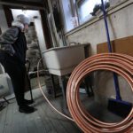 Photo of a lead service line being replaced with copper in Boston