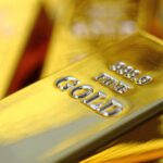 Gold's price is up by more than 14% in 2024. Here are 6 reasons to buy in now.