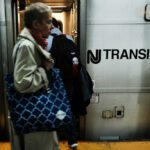 Passengers board an NJ Transit train at Pennsylvania Station on April 26, 2017 in New York City
