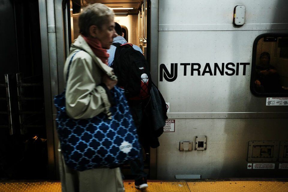 Passengers board an NJ Transit train at Pennsylvania Station on April 26, 2017 in New York City