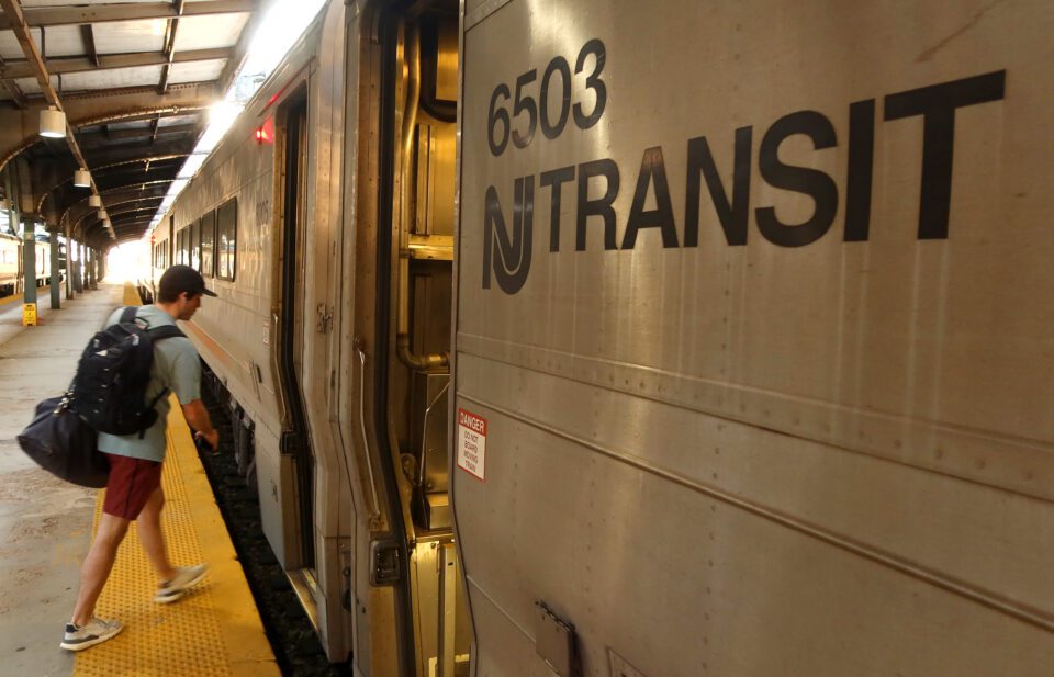 A person boards a NJ Transit train at the Hoboken Transit Terminal on September 1, 2023, in Hoboken, New Jersey.