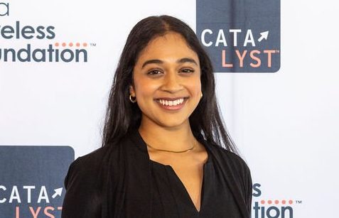 Trisha Prabhu, founder and CEO of ReThink, accepts the 2023 Catalyst Top Grant Award at a Nov. 9 event in Washington, D.C., to celebrate the CTIA Wireless Foundation Catalyst winners.