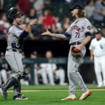 Houston Astros catcher César Salazar (18) and relief pitcher Josh Hader (71) celebrate a victory after closing out the Chicago White Sox in the ninth inning of a game at Guaranteed Rate Field in Chicago on June 19, 2024. (Chris Sweda/Chicago Tribune)
