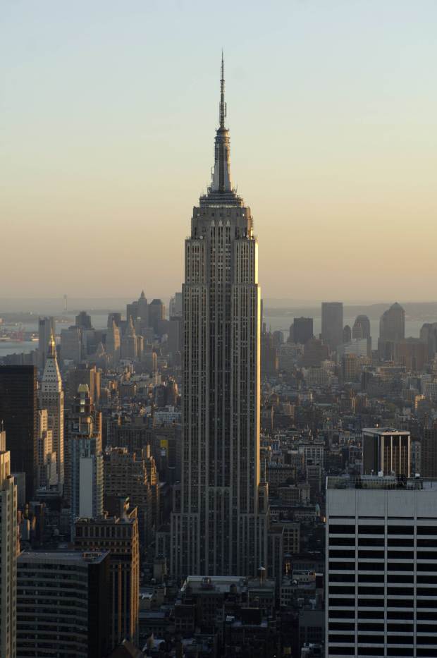 The Empire State Building rises above the Manhattan skyline at sunset, 28 April, 2006, in New York. AFP PHOTO/Stan HONDA