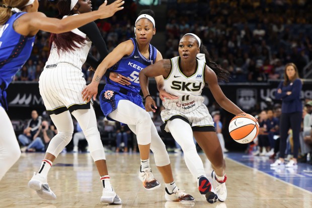 Chicago Sky guard Dana Evans (11) tries to get past Connecticut Sun guard Tyasha Harris (52) during their game at Wintrust Arena on Wednesday, July 12, 2023. (Eileen T. Meslar/Chicago Tribune)
