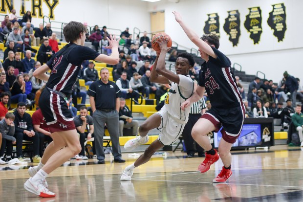 Waubonsie Valley's Tre Blissett (3) drives to the basket during the Class 4A Metea Valley Regional final against Plainfield North on Thursday, Feb. 22 2024. (Troy Stolt for the Aurora News Beacon)