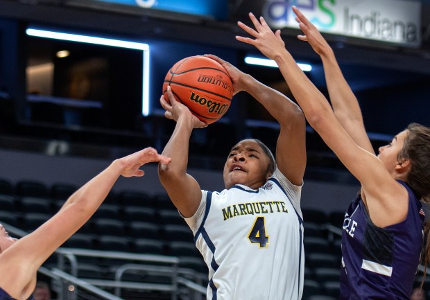 Marquette Catholic's Laniah Davis takes a shot during the Class 1A state championship game against Lanesville at Gainbridge Fieldhouse in Indianapolis on Saturday, Feb. 24, 2024. (Michael Gard/for the Post-Tribune)