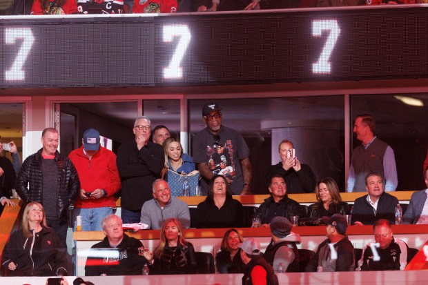 Former Chicago Bulls player Dennis Rodman attends a ceremony to retire Chris Chelios's No. 7 Blackhawks jersey before the Blackhawks play the Detroit Red Wings at the United Center Sunday Feb. 25, 2024 in Chicago. The Chicago native played for the Blackhawks for nine of his 26 NHL seasons. (Armando L. Sanchez/Chicago Tribune)
