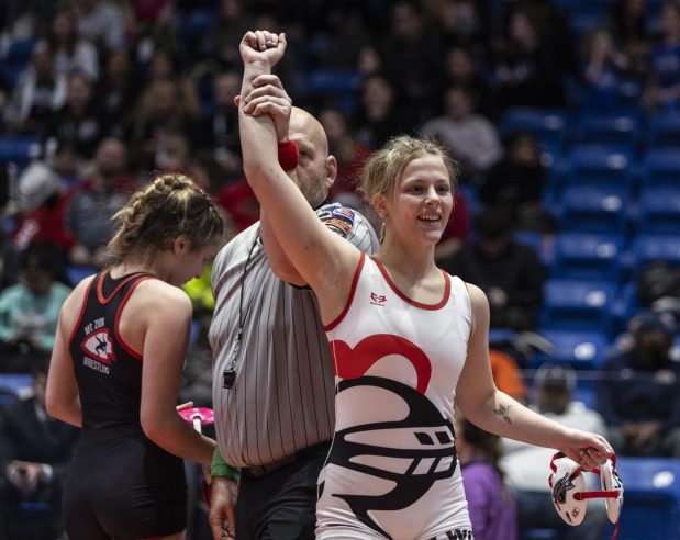 Lincoln-Way Central's Gracie Guarino after beating Mt. Zion's Sydney Cannon in the girls wrestling third-place match at 115 pound in the state meet at Grossinger Motors Arena in Bloomington on Saturday, Feb. 24, 2024. (Vincent D. Johnson / Daily Southtown)