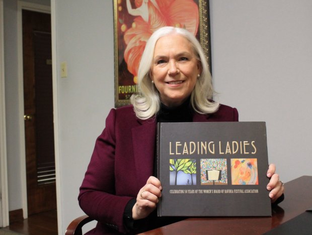 Karen Ettelson with the book she authored about the history of the Ravinia Women's Board. Ettelson was removed from the board for an alleged conduct reason, but Ettelson maintains she did nothing wrong.
