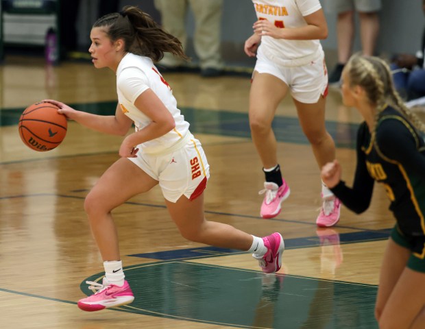 Batavia's Addi Lowe (4) on a fast break after a second quarter steal against Fremd, in the Class 4A Bartlett Supersectional on Monday, Feb. 26, 2024 in Bartlett. Batavia fell 65-46. H. Rick Bamman / For the Beacon-News