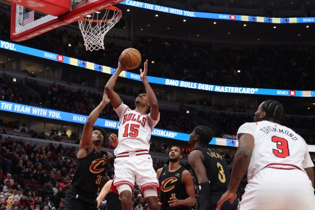 Bulls forward Julian Phillips (15) shoots against the Cavaliers on Feb. 28, 2024, at the United Center. (Terrence Antonio James/Chicago Tribune)