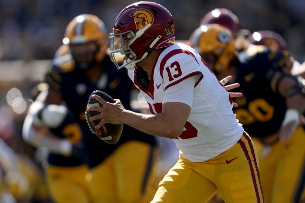 Southern California quarterback Caleb Williams (13) runs against California during the first half of an NCAA college football game in Berkeley, Calif., Saturday, Oct. 28, 2023. (AP Photo/Jed Jacobsohn)