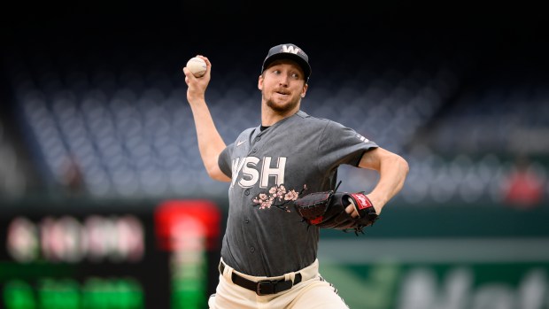 Washington Nationals starting pitcher Erick Fedde (32) in action during the first baseball game of a doubleheader against the Philadelphia Phillies, Friday, Sept. 30, 2022, in Washington. (AP Photo/Nick Wass)
