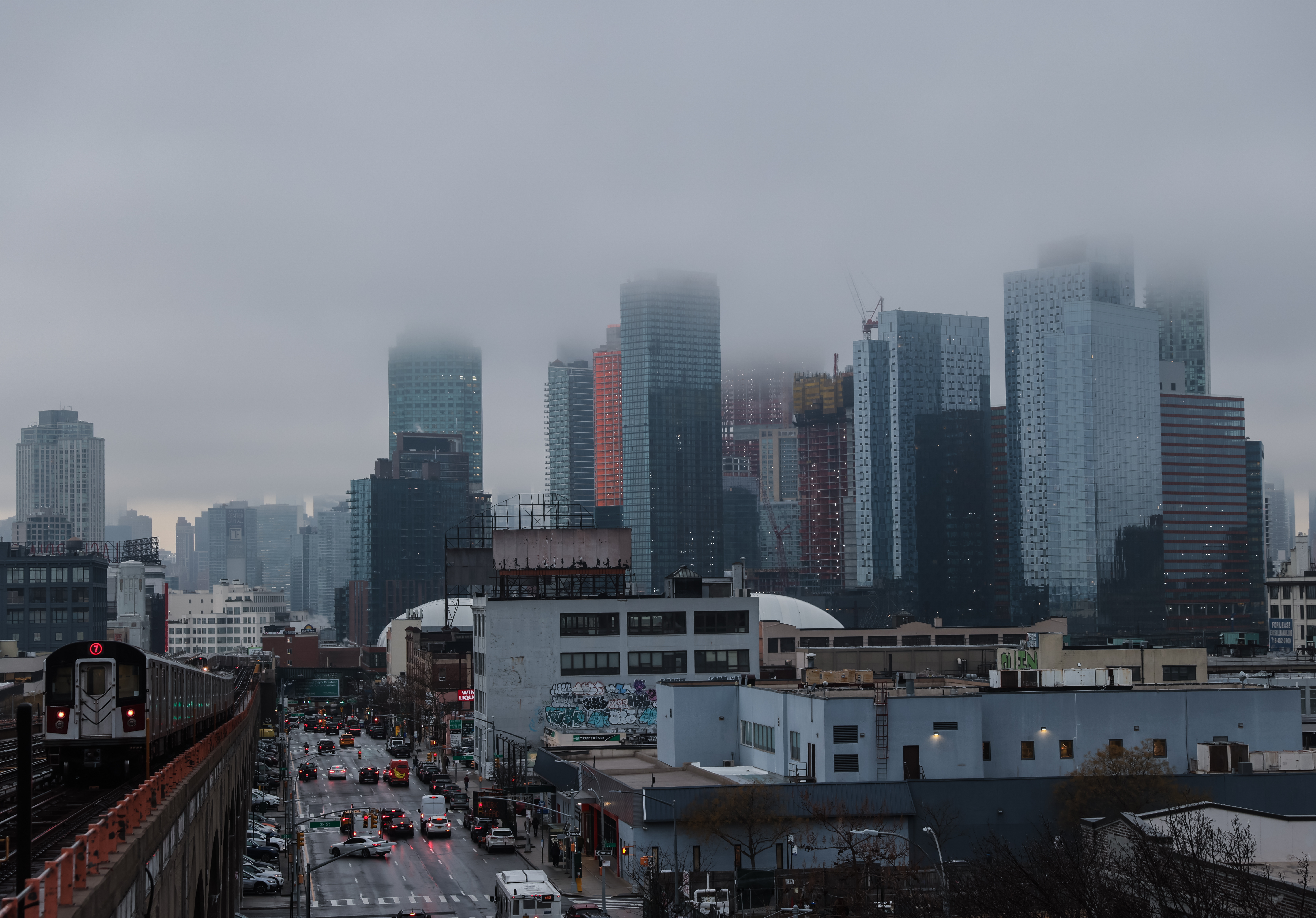 Buildings in Queens shrouded in fog.