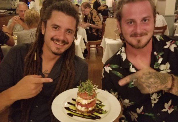 Chef Zach Laidlaw, right, and Hua Momona Farms co-worker Travis Sheffield show off greens grown on the farm that adorn a meal served at a restaurant in the Maui area.- Original Credit: