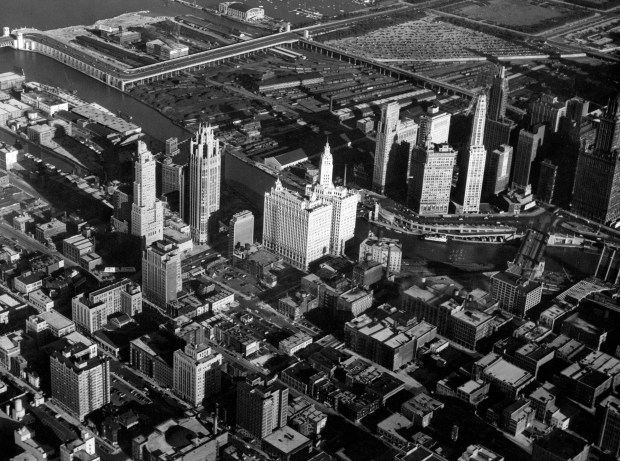An aerial view of Chicago in 1948, shows buildings, including Tribune Tower, the London Guarantee building and others clad in Indiana limestone gleaming in the sunlight. The Wrigley Building, center, made use of terra cotta instead.