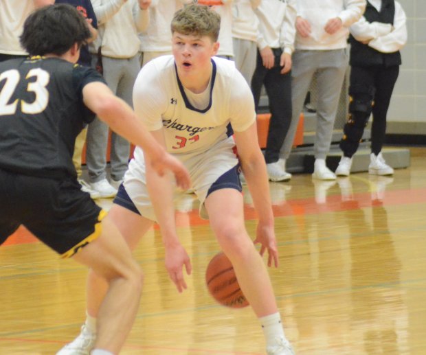 Stagg's Connor Williams dribbles against Andrew during a SouthWest Suburban Red game in Palos Hills on Tuesday, Feb. 6, 2024. (Jeff Vorva / Daily Southtown)