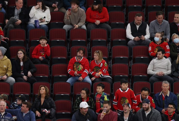 Unenthused Blackhawks fans watch the final seconds of the game against the Avalanche on Feb. 29, 2024, at the United Center. The Blackhawks lost 5-0. (John J. Kim/Chicago Tribune)