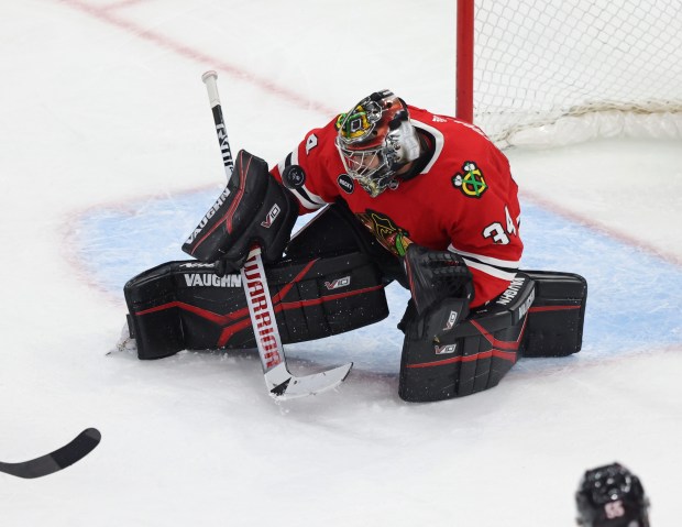 Blackhawks goaltender Petr Mrázek deflects a shot on goal in the third period against the Avalanche on Feb. 29, 2024, at the United Center. (John J. Kim/Chicago Tribune)