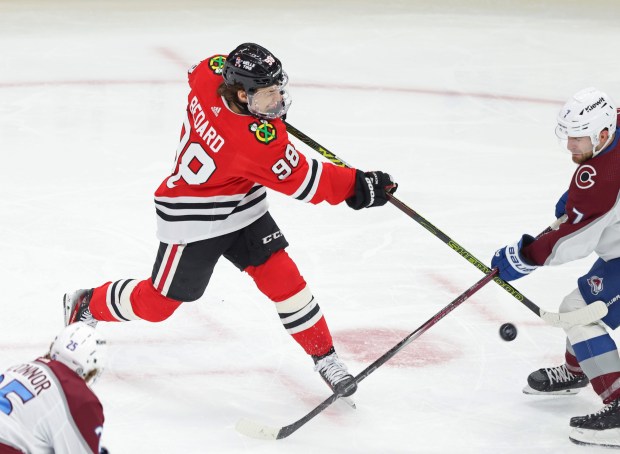 Blackhawks center Connor Bedard takes a slap shot in the second period against the Avalanche on Feb. 29, 2024, at the United Center. (John J. Kim/Chicago Tribune)