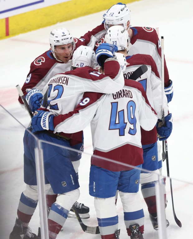 Avalanche players celebrate after a goal from center Ryan Johansen (12) in the second period against the Blackhawks on Feb. 29, 2024, at the United Center. (John J. Kim/Chicago Tribune)