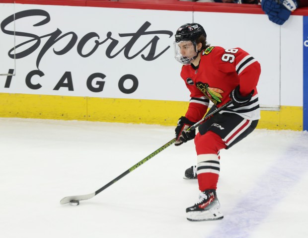 Blackhawks center Connor Bedard advances the puck in the first period against the Avalanche on Feb. 29, 2024, at the United Center. (John J. Kim/Chicago Tribune)