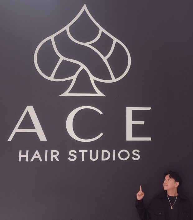 Emilio Chavez opened his new barbershop, Ace Hair Studios, in downtown Elgin with partner, Arnold Noraky, in January. (Mike Danahey/The Courier-News)