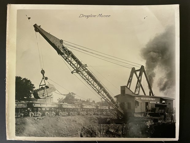 A steam shovel excavates a portion of "The Cut" in Monee in this undated photo provided by the Monee Historical Society. The ravine through the village was dug in 1922 and 1923 by the Illinois Central Railroad to reduce the grade trains had to overcome to get through the town.(Monee Historical Society)