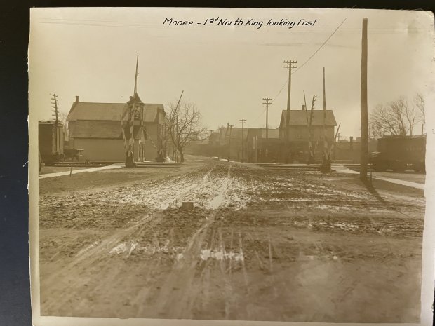 An undated photo provided by the Monee Historical Society offers a view of looking east from Main Street at the Illinois Central Railroad tracks prior to "The Cut," which lowered the rail line by 25 feet below grade. (Monee Historical Socety)