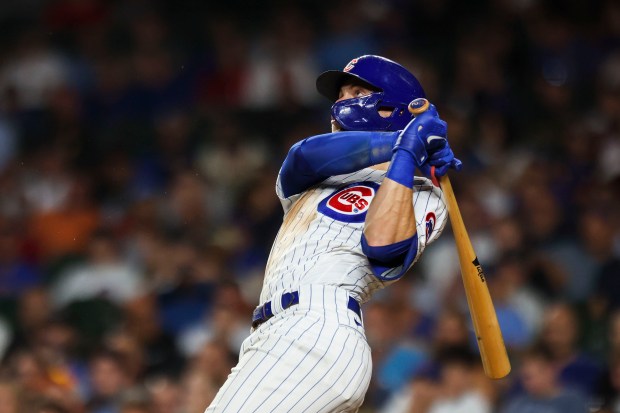 Cubs second baseman Nico Hoerner hits a home run against the Reds on Aug. 1, 2023, at Wrigley Field. (Eileen T. Meslar/Chicago Tribune)