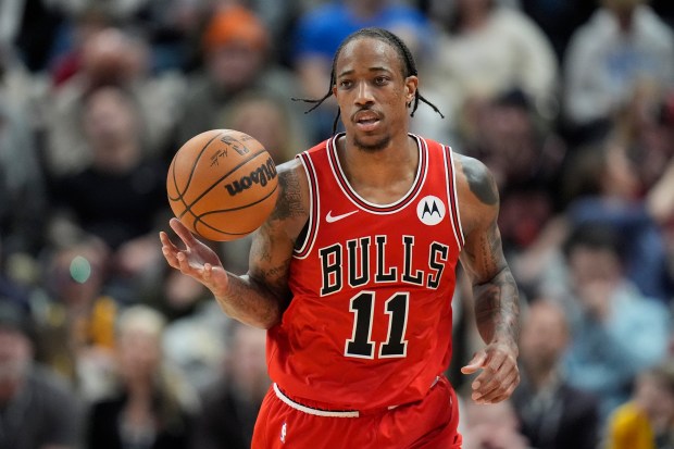 Chicago Bulls forward DeMar DeRozan (11) brings the ball up court during the second half of an NBA basketball game against the Utah Jazz Wednesday, March 6, 2024, in Salt Lake City. (AP Photo/Rick Bowmer)
