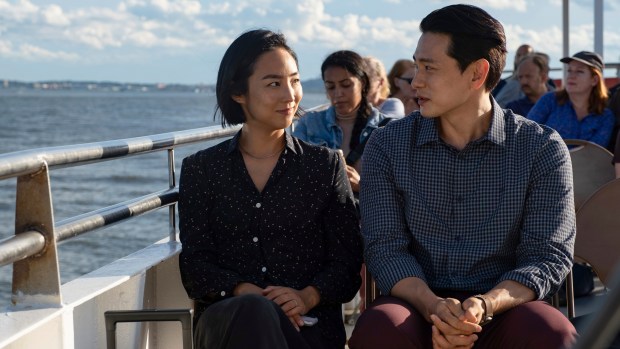 Greta Lee, left, and Teo Yoo in a scene from "Past Lives." (Jon Pack/A24 via AP)