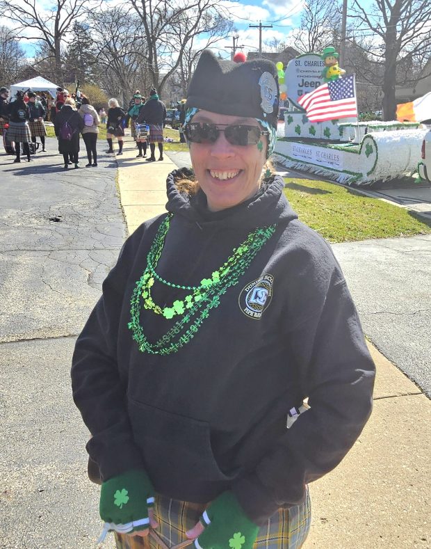 Lacee Hudec of Dundee, a member of the Dundee Scottish Pipe Band, gets set to perform Saturday at the St. Patrick's parade in St. Charles. (David Sharos / For The Beacon-News)