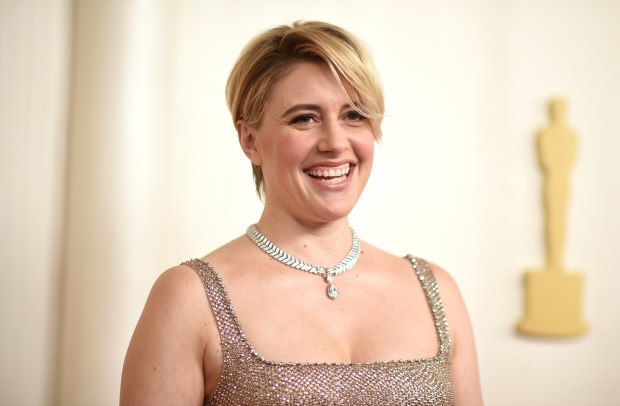 Greta Gerwig arrives at the Oscars on Sunday, March 10, 2024, at the Dolby Theatre in Los Angeles. (Photo by Richard Shotwell/Invision/AP)