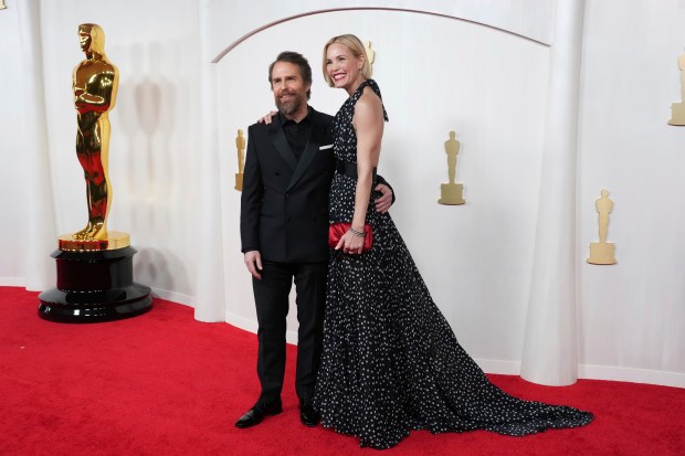 Sam Rockwell, left, and Leslie Bibb arrive at the Oscars on Sunday, March 10, 2024, at the Dolby Theatre in Los Angeles. (Photo by Jordan Strauss/Invision/AP)