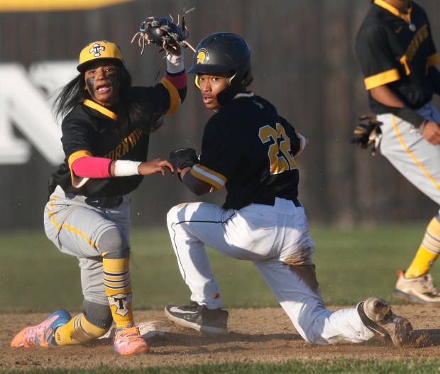 Amira Hondras (3), looks for the call as she puts the tag on a Marian Catholic's Chace Tankson (22). Hondras plays second base on the Thornwood boys varsity team on Friday, March 15, 2024. (John Smierciak/for the Daily Southtown)