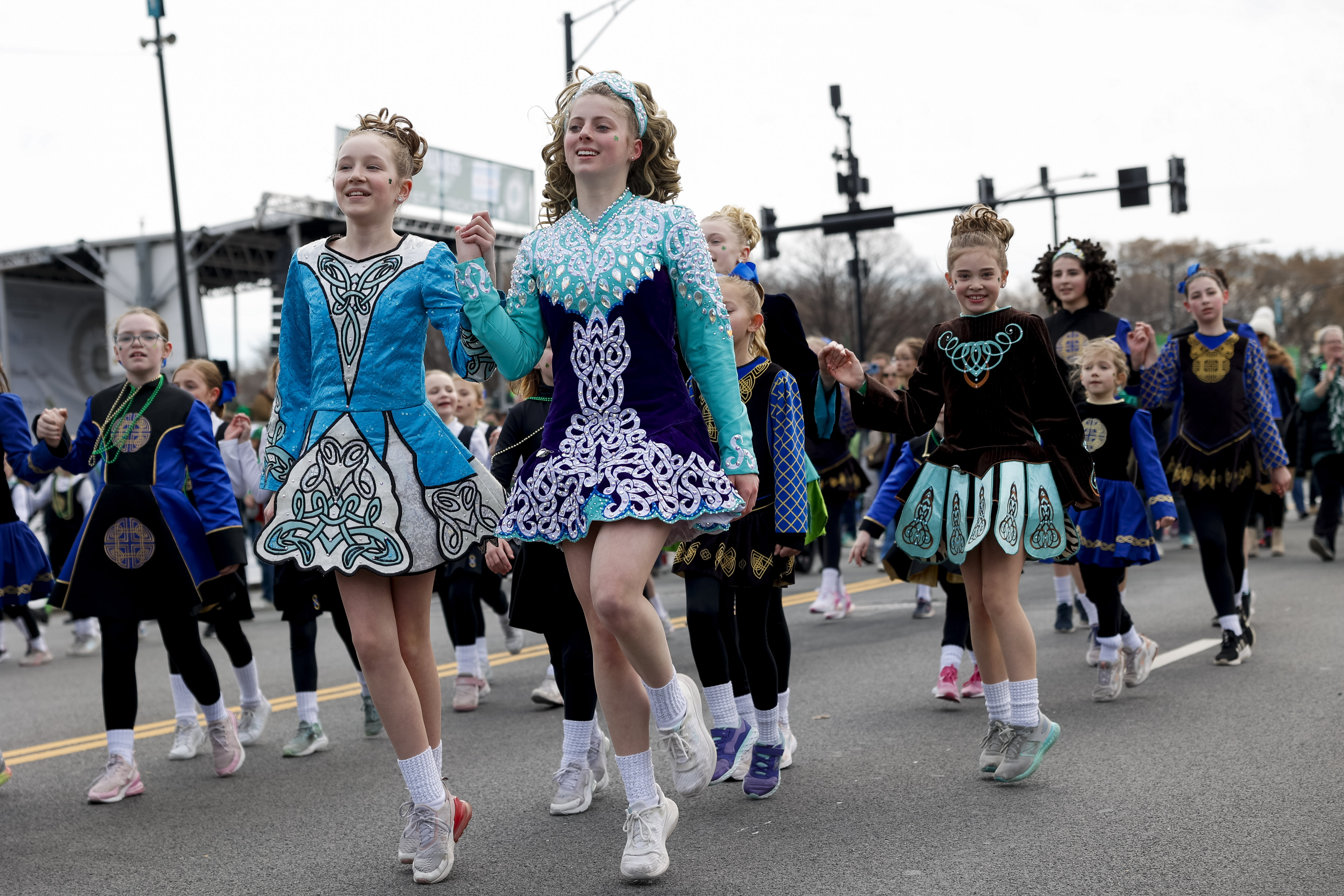 Members of the Foy School of Traditional Irish Dance dance during the annual St. Patrick's Day Parade in downtown Chicago on March 16, 2024. (Vincent Alban/Chicago Tribune)