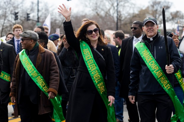 Justice Eileen O'Neill Burke, candidate for Cook County State's Attorney, waves to the crowd during the annual St. Patrick's Day Parade on Saturday, March 16, 2024, on Columbus Drive in Chicago. (Vincent Alban/Chicago Tribune)