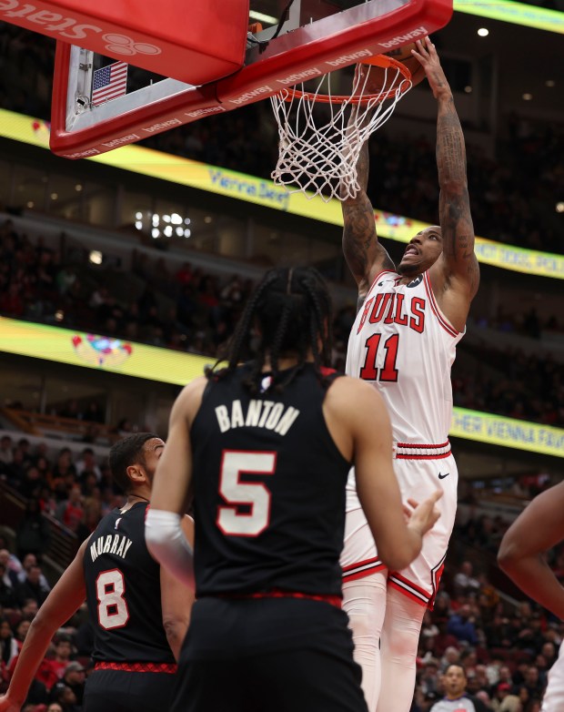 Chicago Bulls forward DeMar DeRozan (11) dunks against Portland Trail Blazers guard Dalano Banton (5) in the first half Monday, March 18, 2024, at the United Center. (Brian Cassella/Chicago Tribune)