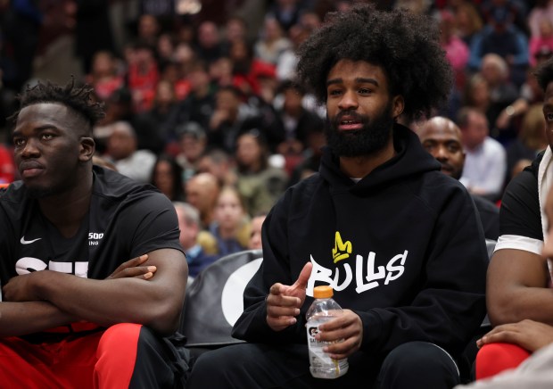 Chicago Bulls guard Coby White watches the first half from the bench Monday, March 18, 2024, at the United Center. (Brian Cassella/Chicago Tribune)