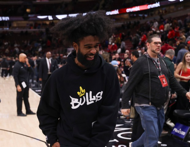 Chicago Bulls guard Coby White laughs as he leaves the court after the win Monday, March 18, 2024, at the United Center. (Brian Cassella/Chicago Tribune)