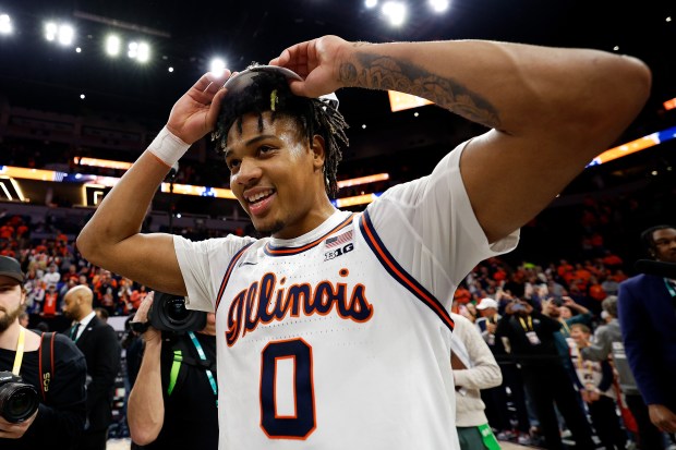 Illinois' Terrence Shannon Jr. celebrates after the Illini beat Wisconsin for the Big Ten Tournament title on Sunday, March 17, 2024, in Minneapolis. (David Berding/Getty Images)