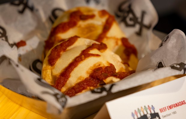 The beef empanadas with fire-roasted tomato salsa available in Section 140 as the White Sox preview new food offerings Thursday, March 21, 2024, at Guaranteed Rate Field. (Brian Cassella/Chicago Tribune)