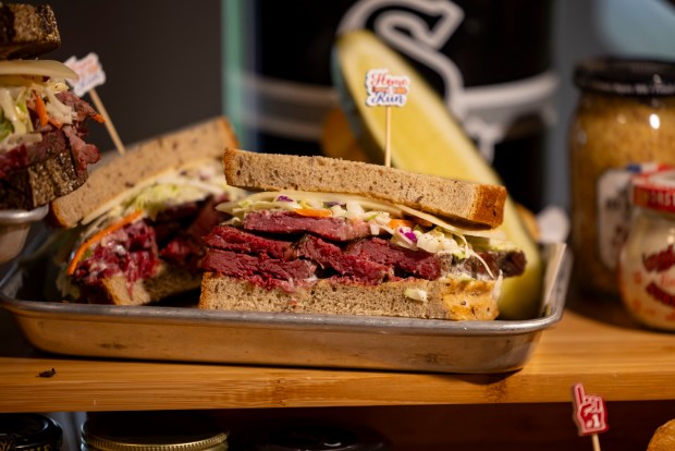 The Settling a Beef sandwich with Vienna corned beef, Swiss cheese, coleslaw and dark mustard on rye bread available at the Huntington Bank Stadium Club as the White Sox preview new food offerings Thursday, March 21, 2024, at Guaranteed Rate Field. (Brian Cassella/Chicago Tribune)