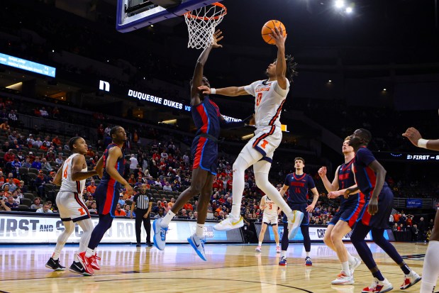 Illinois guard Terrence Shannon Jr. drives for a basket against Duquesne during an NCAA Tournament game on March 23, 2024, in Omaha, Neb. Shannon scored 30 points. (John Peterson/AP photo)
