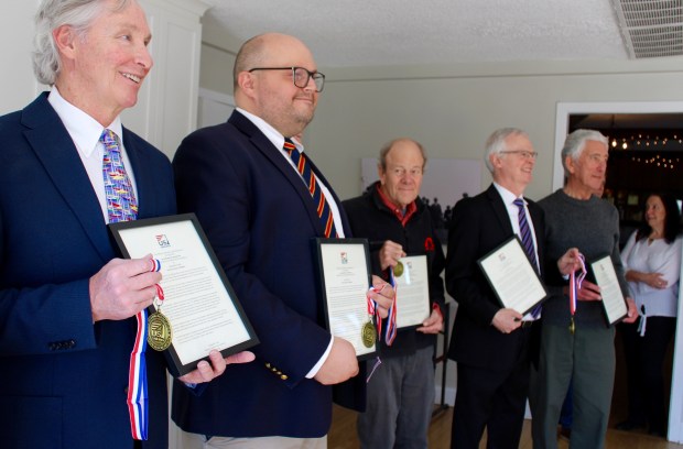 The U.S. Sailing Association presented yachting's highest honor to 5 local sailors, who last Sept. rescued a man overboard under trying conditions in a ceremony held at the Sheridan Shore Yacht Club at Wilmette Harbor on Saturday, March 23. (Photo by Gina Grillo)