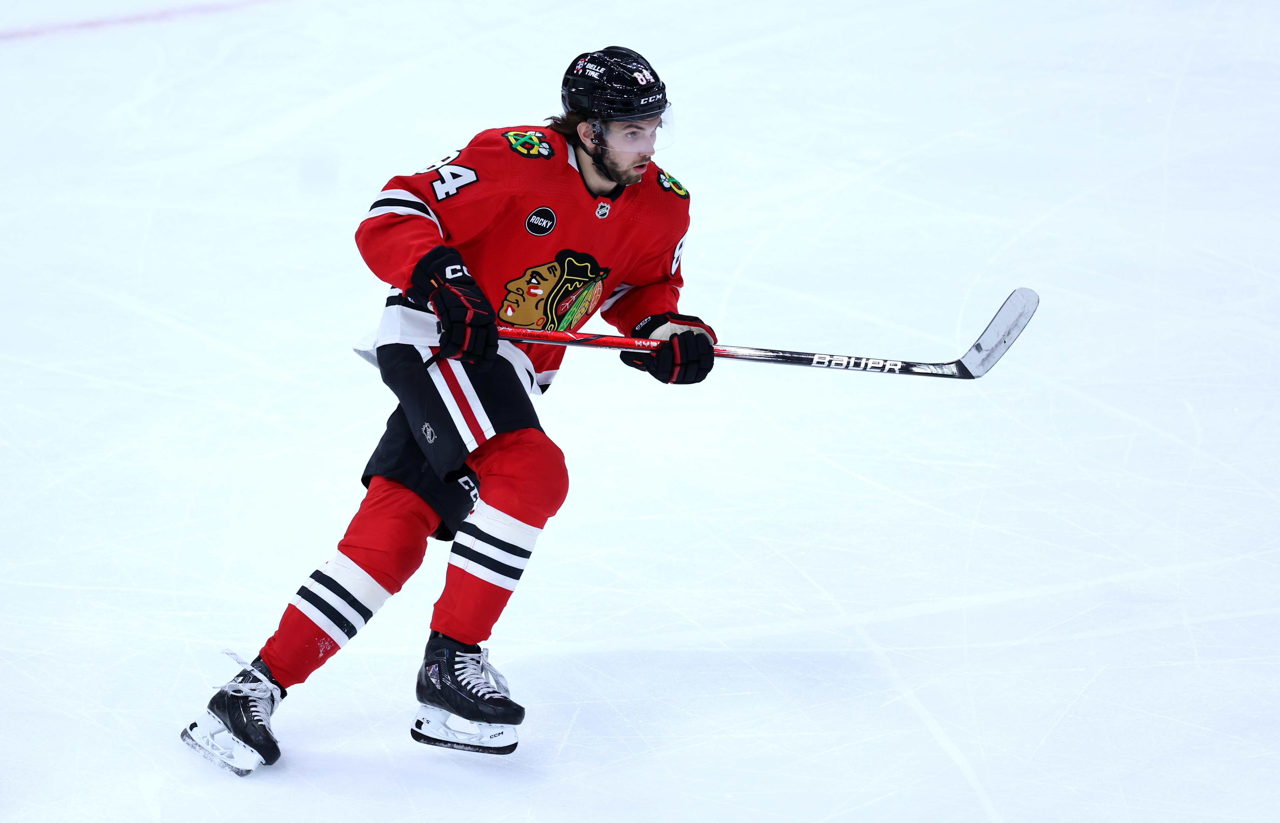 Chicago Blackhawks left wing Landon Slaggert (84) skates down the ice in the second period of a game against the Calgary Flames at the United Center in Chicago on March 26, 2024. (Chris Sweda/Chicago Tribune)