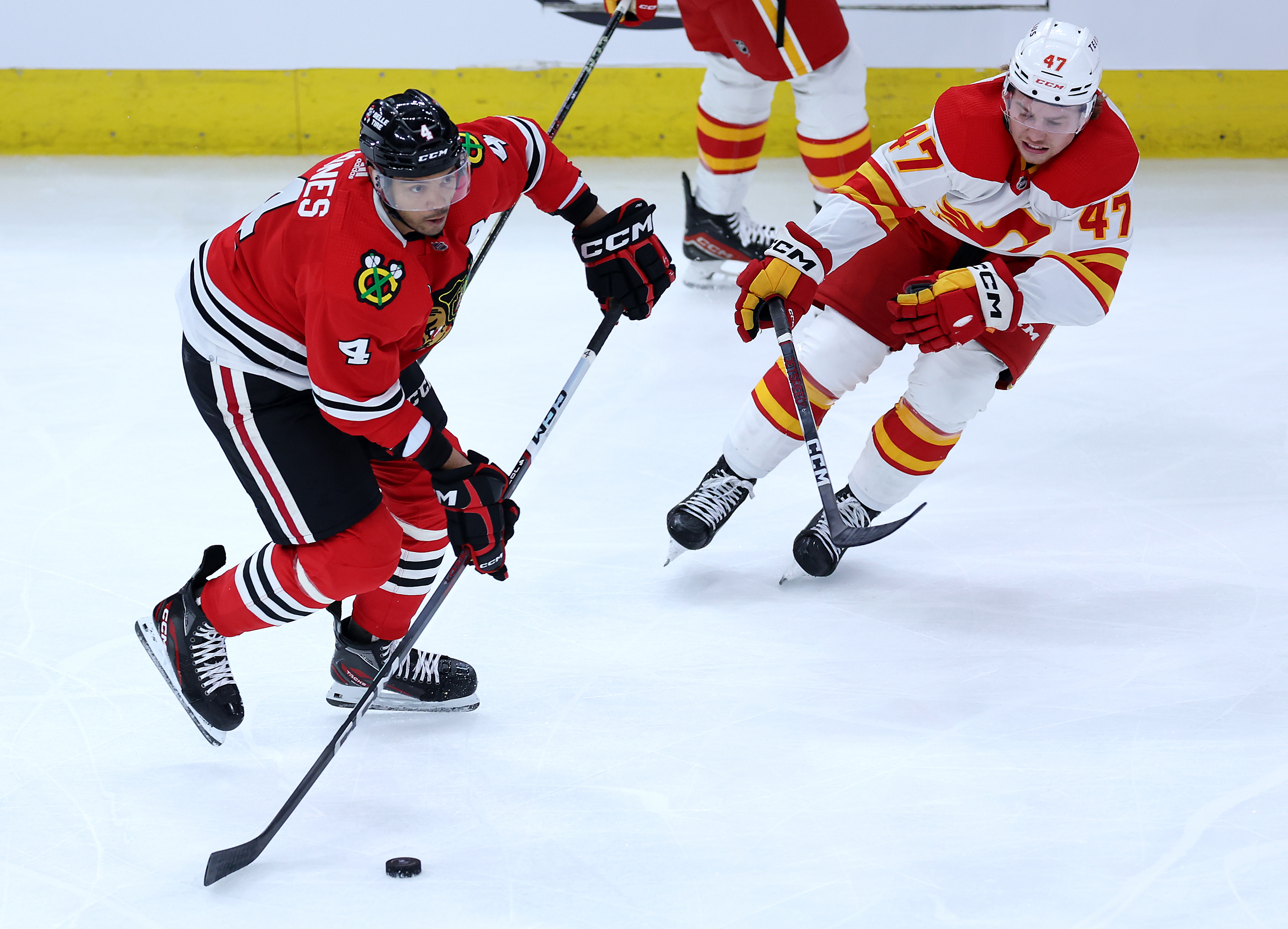 Chicago Blackhawks defenseman Seth Jones (4) looks to make a pass in the second period of a game against the Calgary Flames at the United Center in Chicago on March 26, 2024. (Chris Sweda/Chicago Tribune)