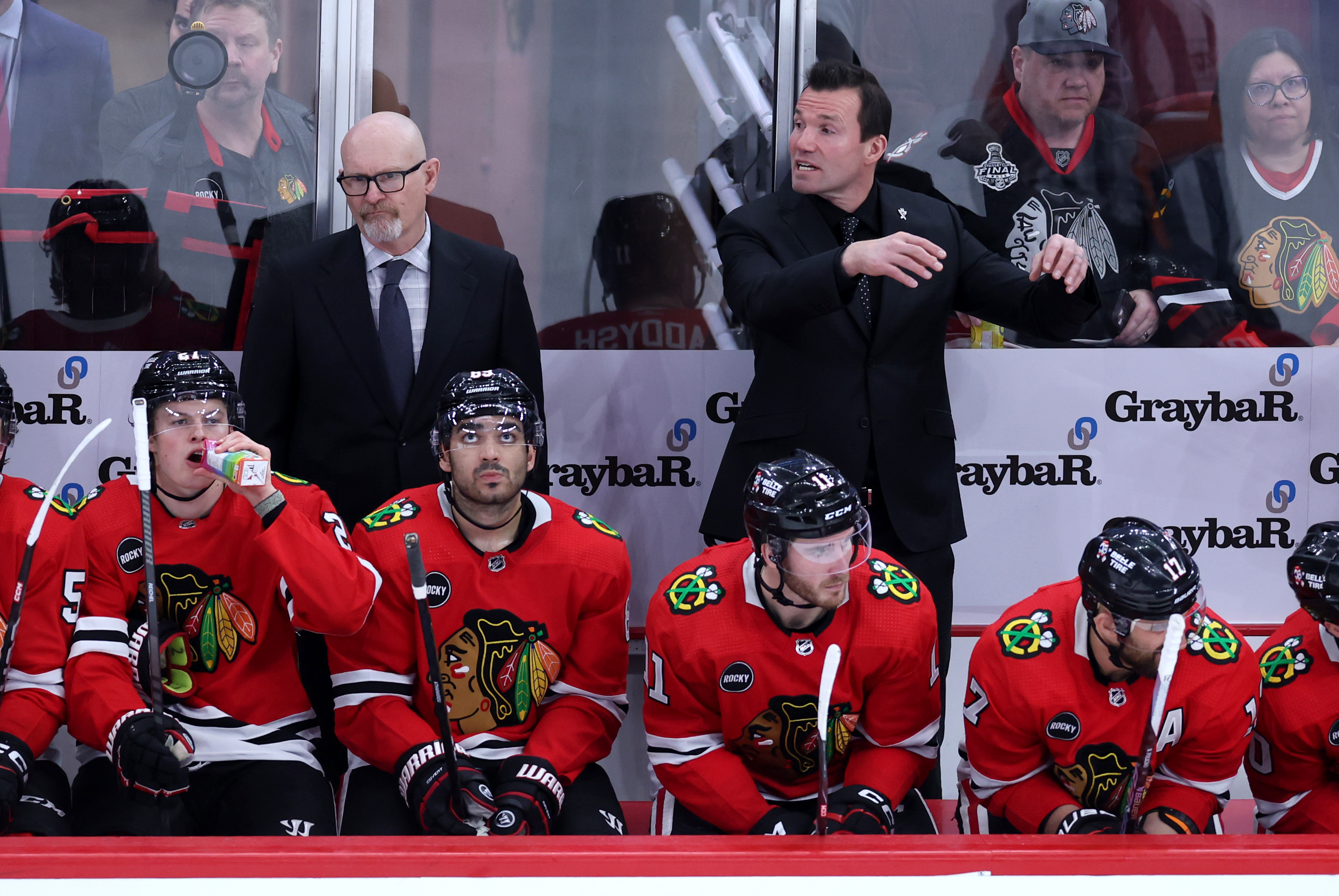 Chicago Blackhawks head coach Luke Richardson talks to his team in the third period of a game against the Calgary Flames at the United Center in Chicago on March 26, 2024. (Chris Sweda/Chicago Tribune)